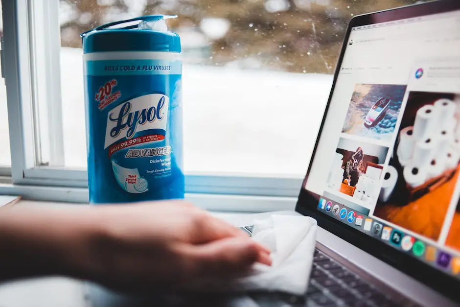 Illustration of a person cleaning a laptop keyboard with compressed air.